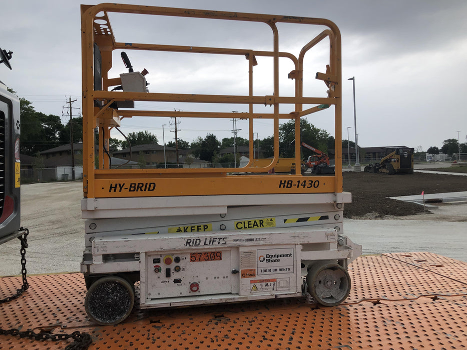 Custom Equipment HB-1430 <ul>
 <li>Hy-Brid Scissor Lift</li>
  <li>Platform capacity up to 670 lbs.</li>
  <li>Working height up to 20 ft</li>
  <li>Weighs under 1,700 lbs.</li>
  <li>Non-marking wheels </li>
</ul>