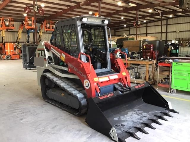 2019 Takeuchi TL8 Cab, Heat/AC, Defroster, 15" Wide Rubber Tracks, Back-up Alarm, Front & Rear Working Lights, Auxiliary Hydraulics, Two-Speed Travel, Electronic Monitoring System, Hydraulic Universal Quick Hitch 76" HD Dirt Bucket with 8 Teeth, 20.3 cubic feet Capacity