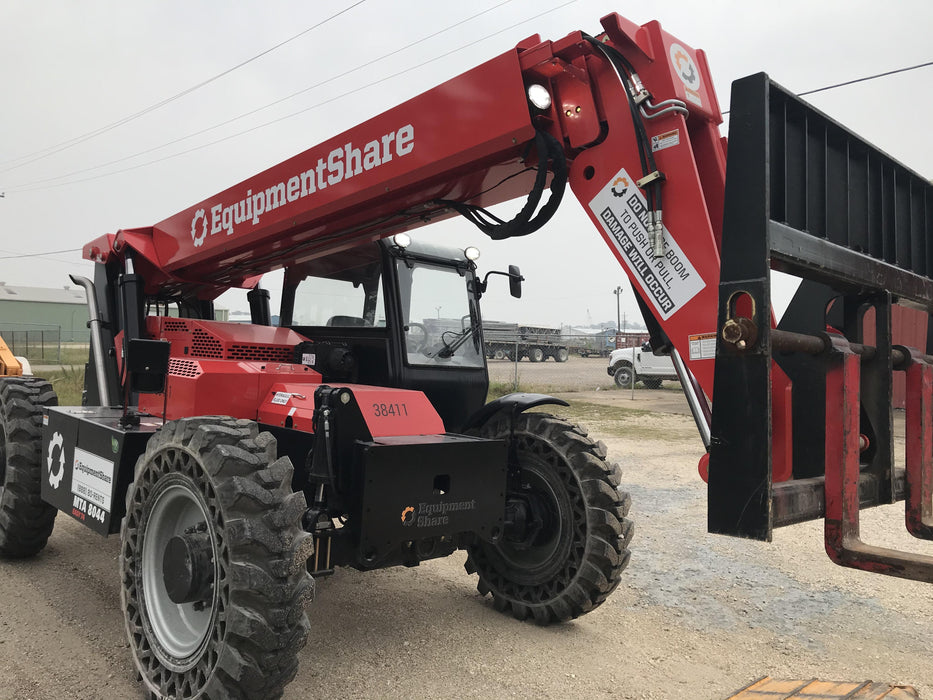 2019 Manitou MTA8044 74hp T4F, Cab/Heat/Air, Cab and Boom LED work lights, Auxiliary Hydraulics, Solid Tires, Amber strobe, Lift Hook 66" Carriage, 60" Forks