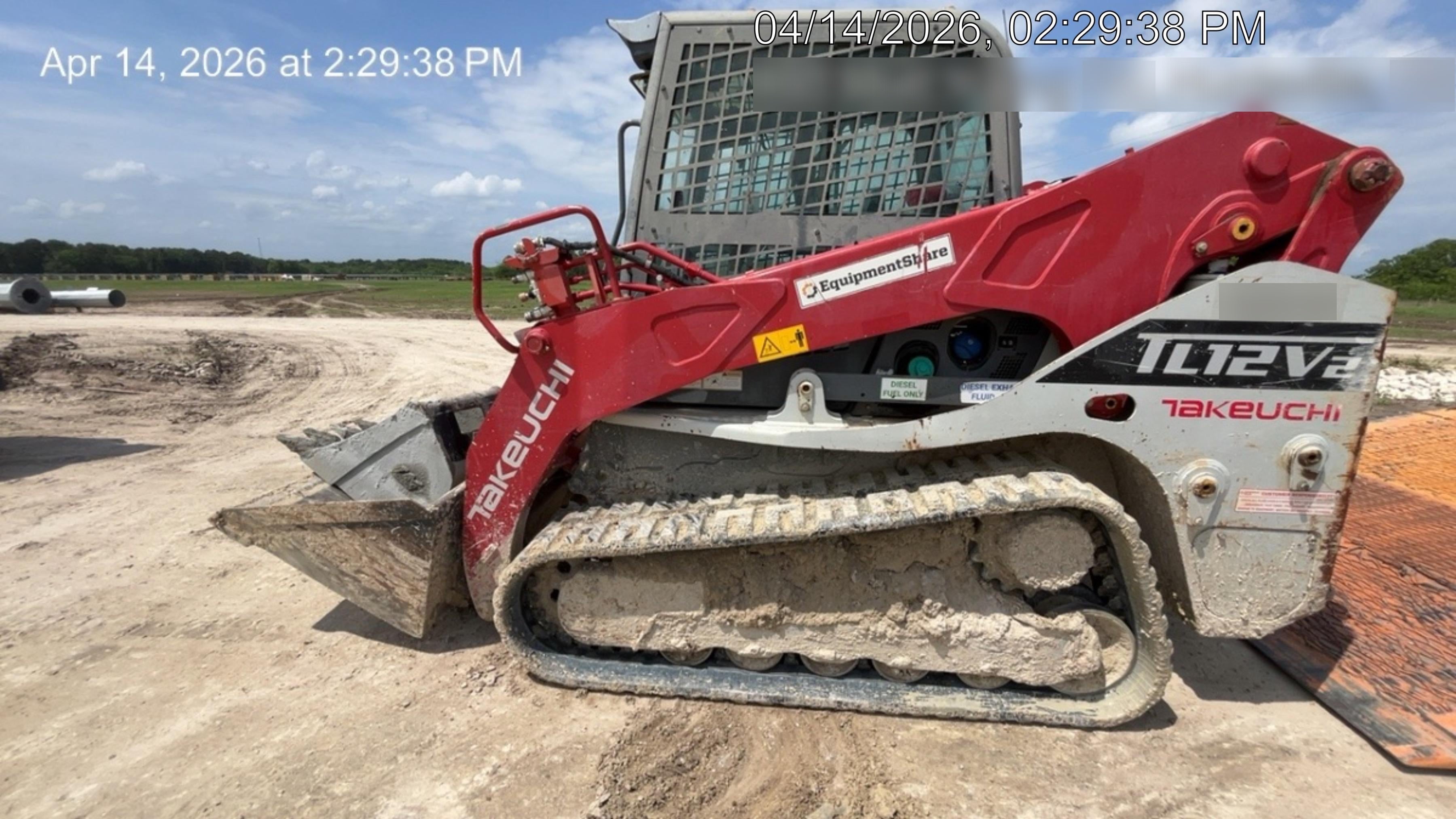 2019 Takeuchi TL12V2C ROPS/FOPS Cab, Heat/AC, Defroster, Rubber Tracks, Back-up Alarm, Front & Rear Working Lights, Auxiliary Hydraulics, Two-Speed Travel, Electronic Monitoring System, Hydraulic Universal Quick Hitch w/80" HD Smooth Dirt Bucket with Bolt-on Edge, 24.0 cu ft. Capacity