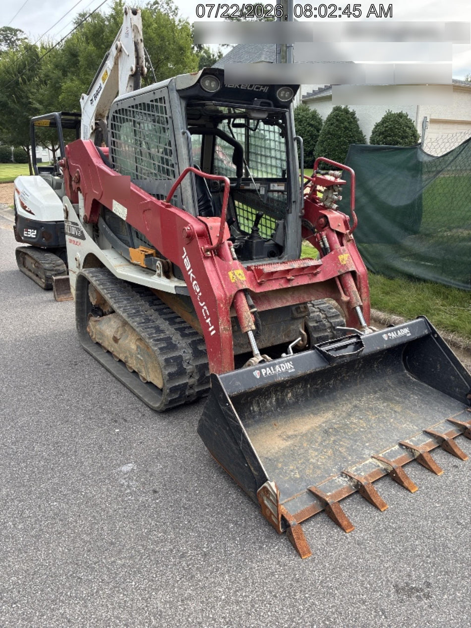 2019 Takeuchi TL10V2-CR Cab/Heat/AC, Rubber Tracks, Backup Alarm, Front & rear working Lights, Auxiliary Hydraulics, 2 Speed Travel, Engine Monitoring System, Hydraulic universal quick hitch w/76" HD dirt bucket with 8 teeth, 20.3 cubic feet capacity, 48" Pallet forks and frame