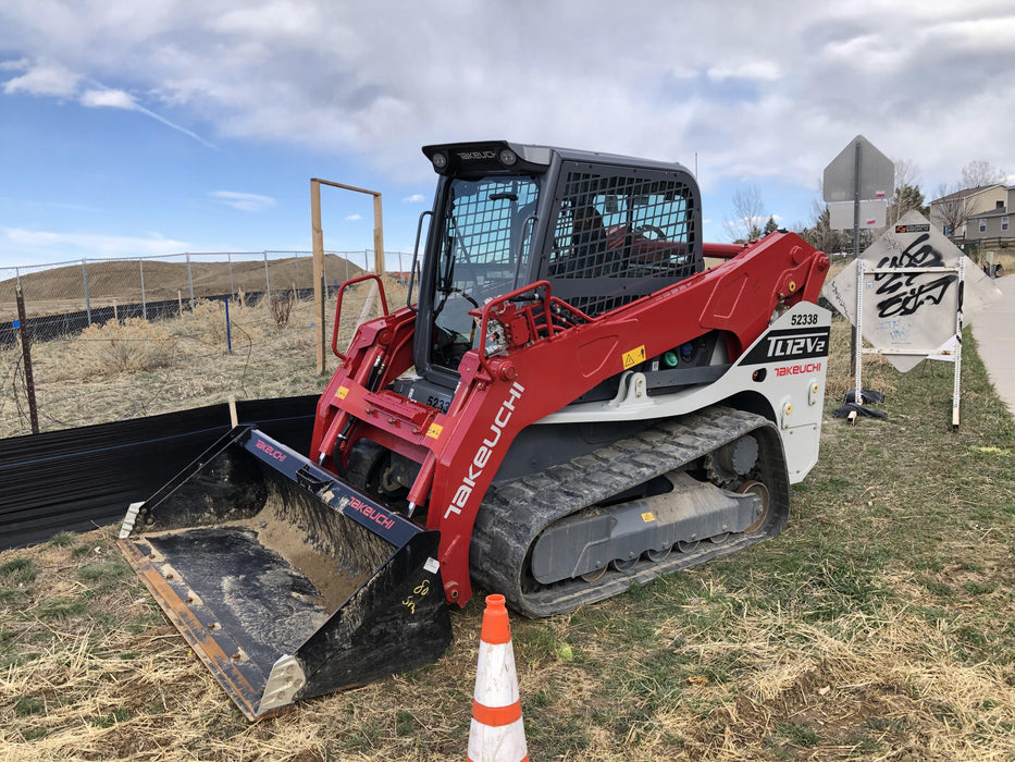 2019 Takeuchi TL12V2C ROPS/FOPS Cab, Heat/AC, Defroster, Rubber Tracks, Back-up Alarm, Front & Rear Working Lights, Auxiliary Hydraulics, Two-Speed Travel, Electronic Monitoring System, Hydraulic Universal Quick Hitch w/80" HD Smooth Dirt Bucket with Bolt-on Edge, 24.0 cu ft. Capacity