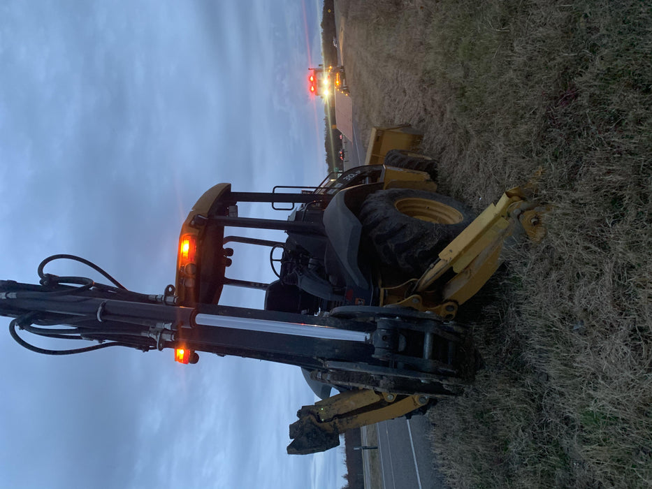 2019 John Deere 310LEP 4wd, Canopy, Standard dipper, ISO, Rear Auxiliary Hydraulics, Manual QC, 12”, 18”, and 24” buckets