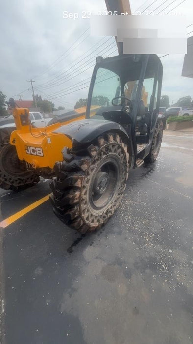 2019 JCB 509-42 74 HP w/Open ROPS, Beacon, Aux Hydraulics, LED Work lights, Solid Tires 66" Carriage/60" Forks