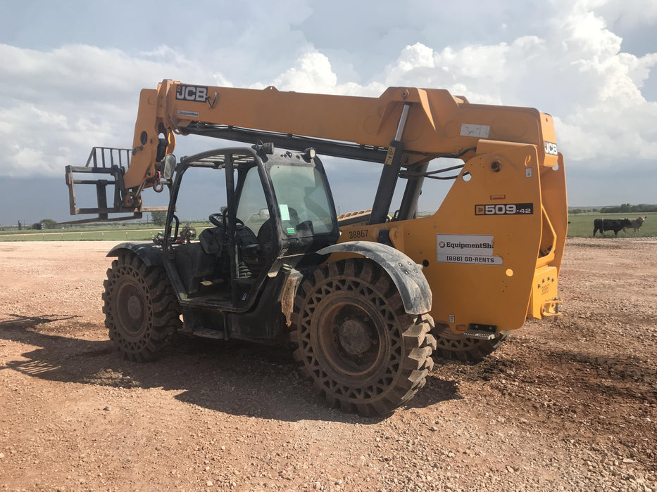 2019 JCB 509-42 74 HP w/Open ROPS, Beacon, Aux Hydraulics, LED Work lights, Solid Tires 66" Carriage/60" Forks