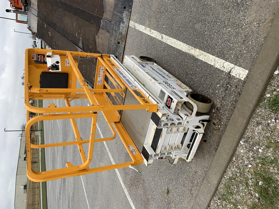 Custom Equipment HB-1430 <ul>
 <li>Hy-Brid Scissor Lift</li>
  <li>Platform capacity up to 670 lbs.</li>
  <li>Working height up to 20 ft</li>
  <li>Weighs under 1,700 lbs.</li>
  <li>Non-marking wheels </li>
</ul>