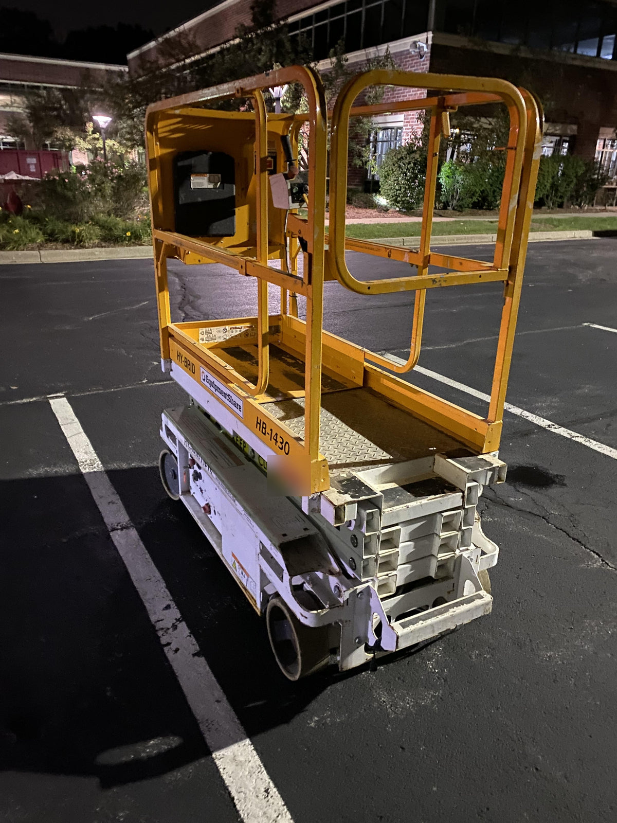 Custom Equipment HB-1430 <ul>
 <li>Hy-Brid Scissor Lift</li>
  <li>Platform capacity up to 670 lbs.</li>
  <li>Working height up to 20 ft</li>
  <li>Weighs under 1,700 lbs.</li>
  <li>Non-marking wheels </li>
</ul>