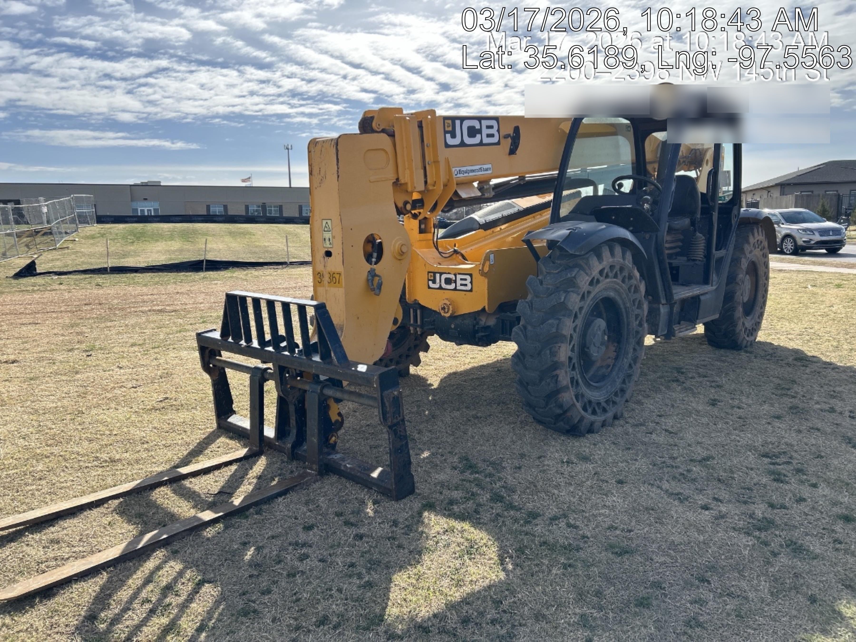 2019 JCB 509-42 74 HP w/Open ROPS, Beacon, Aux Hydraulics, LED Work lights, Solid Tires 66" Carriage/60" Forks