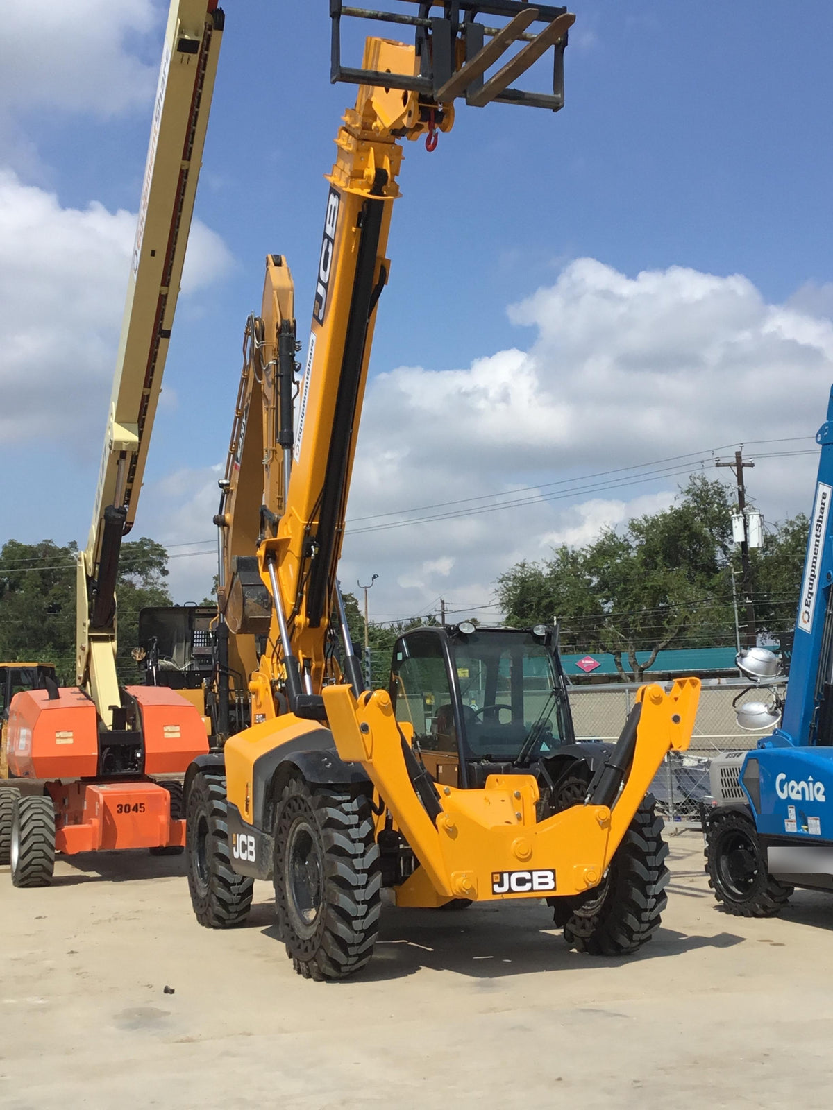 2019 JCB 510-56 Enclosed Cab, 74 HP, Solid Tires, Worklights, Beacon, Aux Hydraulics, Lifting Eye w/66" Carriage/60" Forks