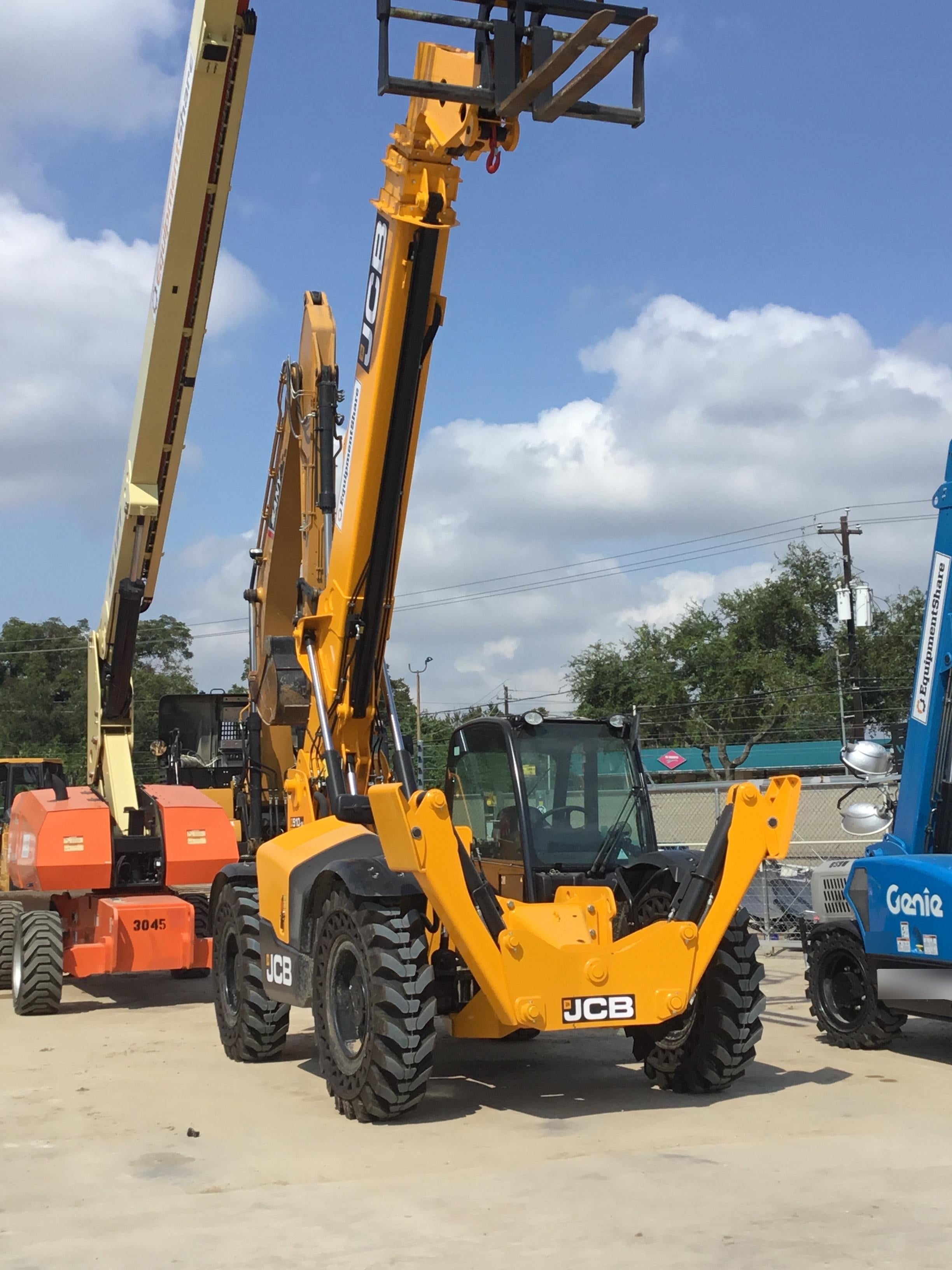 2019 JCB 510-56 Enclosed Cab, 74 HP, Solid Tires, Worklights, Beacon, Aux Hydraulics, Lifting Eye w/66" Carriage/60" Forks