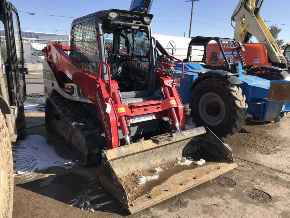 2019 Takeuchi TL12V2C ROPS/FOPS Cab, Heat/AC, Defroster, Rubber Tracks, Back-up Alarm, Front & Rear Working Lights, Auxiliary Hydraulics, Two-Speed Travel, Electronic Monitoring System, Hydraulic Universal Quick Hitch w/80" HD Dirt Bucket with 9 Teeth 24.0 cu.ft. Capacity