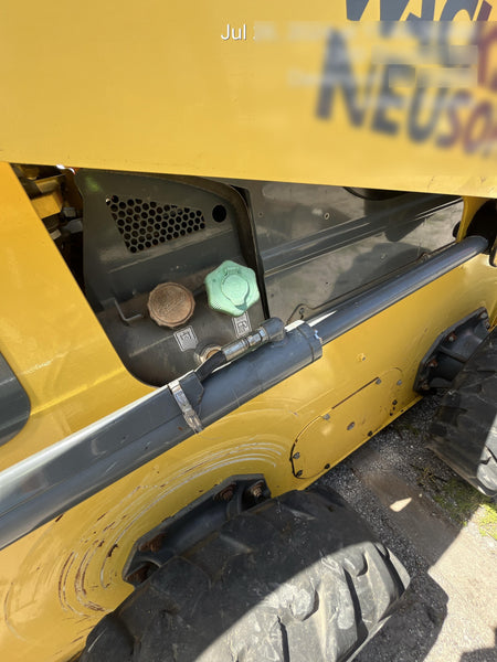 Wacker Neuson SW24 SW24 8k Wheeled Skid Loader, open ROPS, 75" Bucket LP w/ smooth bolt on edge, 72” Angle broom w/universal controller 8 pin