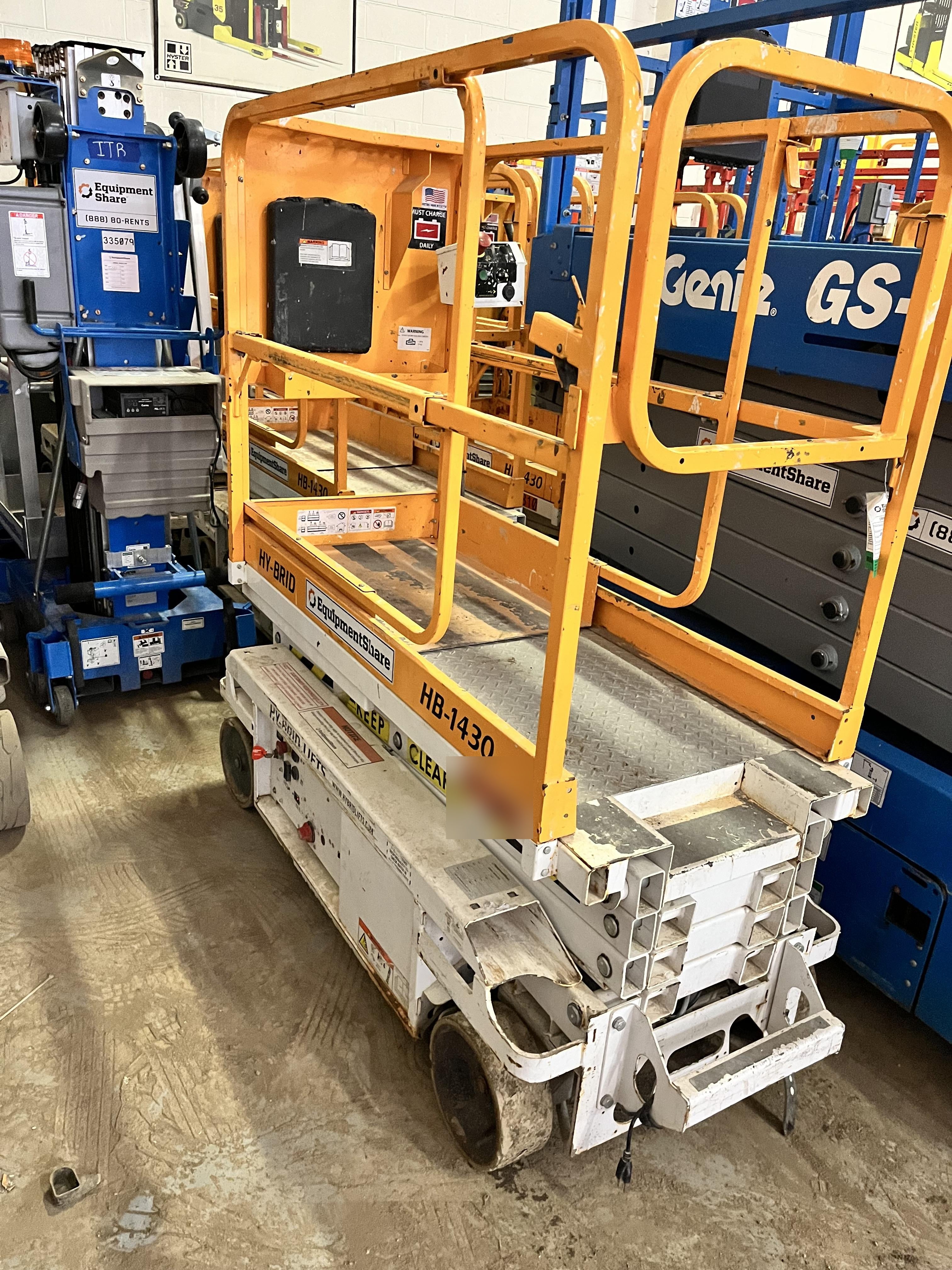 Custom Equipment HB-1430 <ul>
 <li>Hy-Brid Scissor Lift</li>
  <li>Platform capacity up to 670 lbs.</li>
  <li>Working height up to 20 ft</li>
  <li>Weighs under 1,700 lbs.</li>
  <li>Non-marking wheels </li>
</ul>