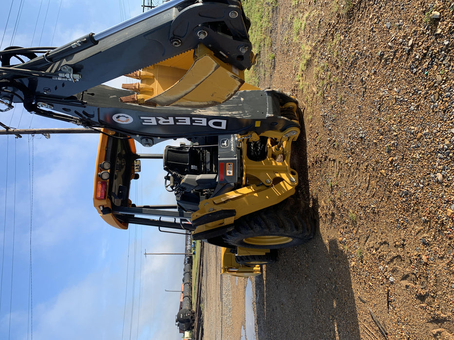 2019 John Deere 310LEP - Extendable Stick 4WD, Canopy, Extendable dipper, ISO Controls, 2 way Auxiliary Hydraulics, 4 in 1 Loader bucket w/ hook, Beacon w/ Buckets: 12”, 18”, and 24
