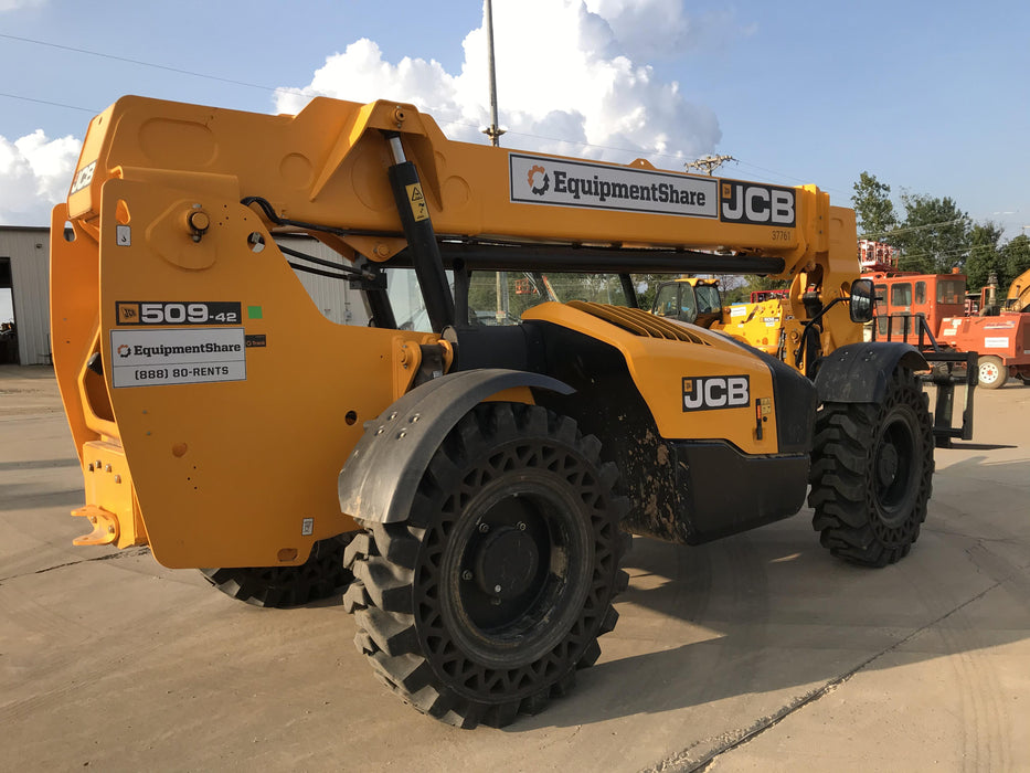 2019 JCB 509-42 Open ROPS, 74 HP, Solid Tires, Worklights, Beacon, Aux Hydraulics, Lifting Eye 66" Carriage/60" Forks