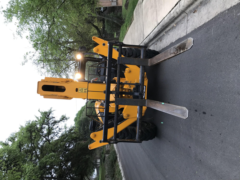 2019 JCB 510-56 74 HP w/Open ROPS, Beacon, Aux Hydraulics, Worklights, Solid Tires w/60" Carriage/Forks