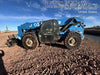 2019 Genie GTH-1056 6' Forks* Genie GTH-1056 w/Enclosed Cab w/HVAC, Work Lights, Solid Tires, Beacon, 60" Carriage and Forks