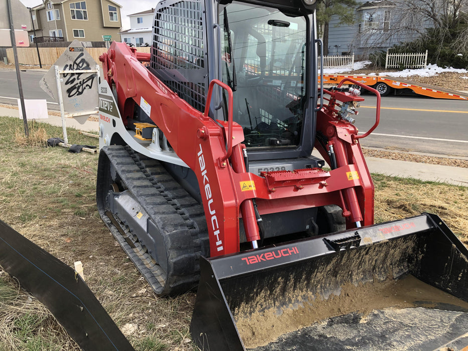 2019 Takeuchi TL12V2C ROPS/FOPS Cab, Heat/AC, Defroster, Rubber Tracks, Back-up Alarm, Front & Rear Working Lights, Auxiliary Hydraulics, Two-Speed Travel, Electronic Monitoring System, Hydraulic Universal Quick Hitch w/80" HD Smooth Dirt Bucket with Bolt-on Edge, 24.0 cu ft. Capacity