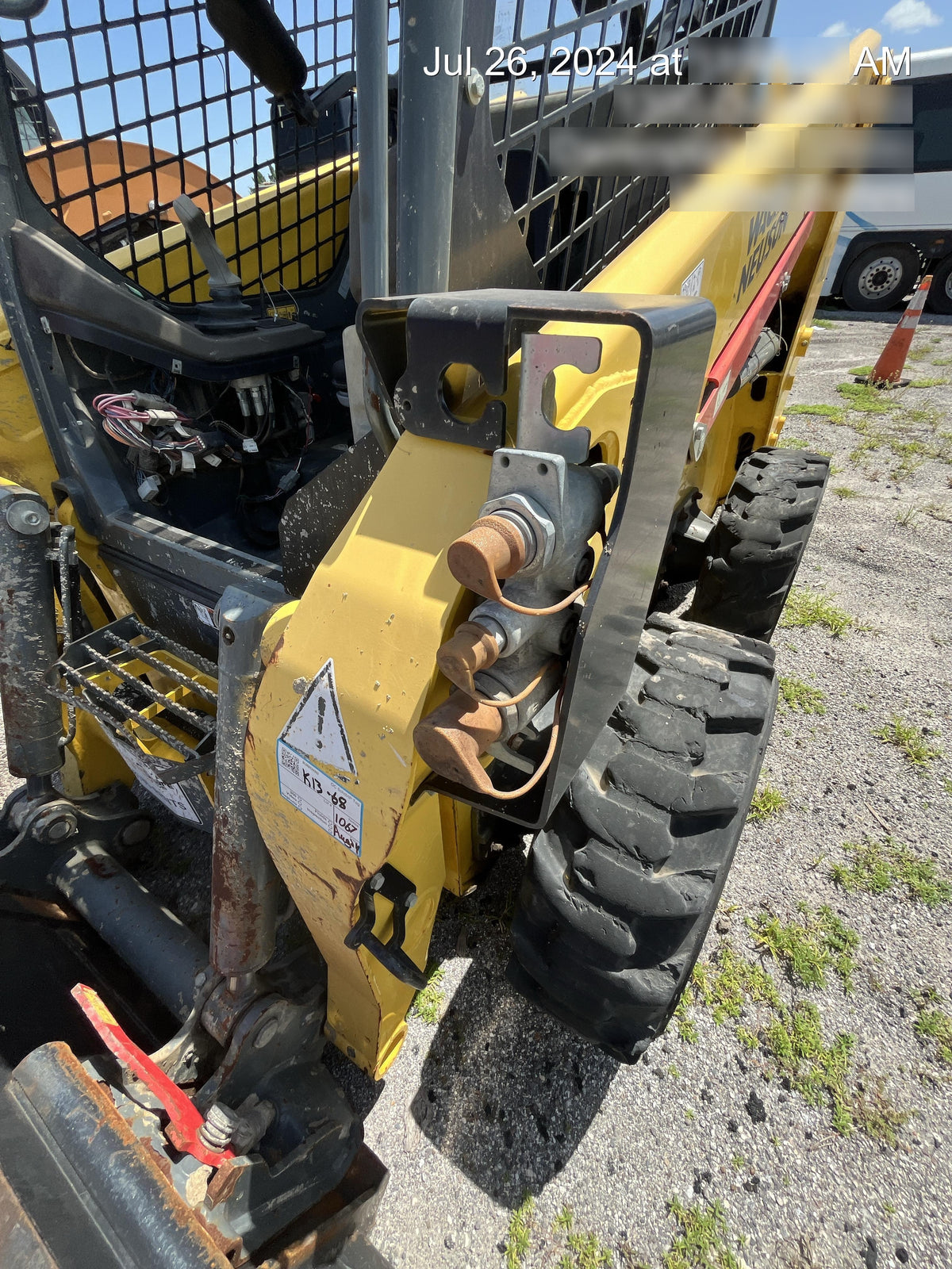Wacker Neuson SW24 SW24 8k Wheeled Skid Loader, open ROPS, 75" Bucket LP w/ smooth bolt on edge, 72” Angle broom w/universal controller 8 pin