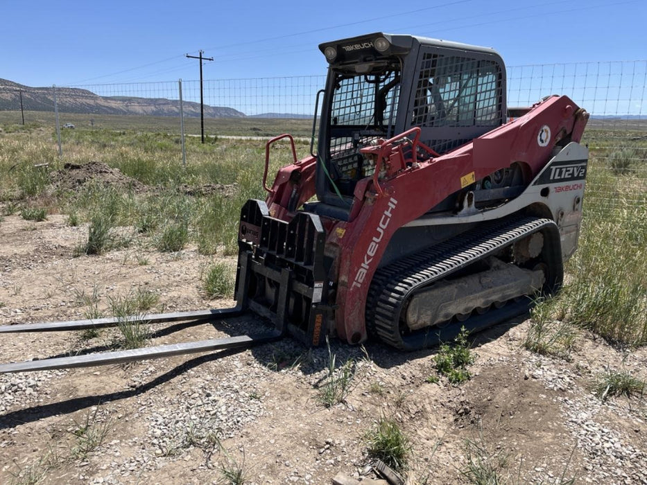 2019 Takeuchi TL12V2C ROPS/FOPS Cab, Heat/AC, Defroster, Rubber Tracks, Back-up Alarm, Front & Rear Working Lights, Auxiliary Hydraulics, Two-Speed Travel, Electronic Monitoring System, Hydraulic Universal Quick Hitch w/80" HD Dirt Bucket with 9 Teeth 24.0 cu.ft. Capacity