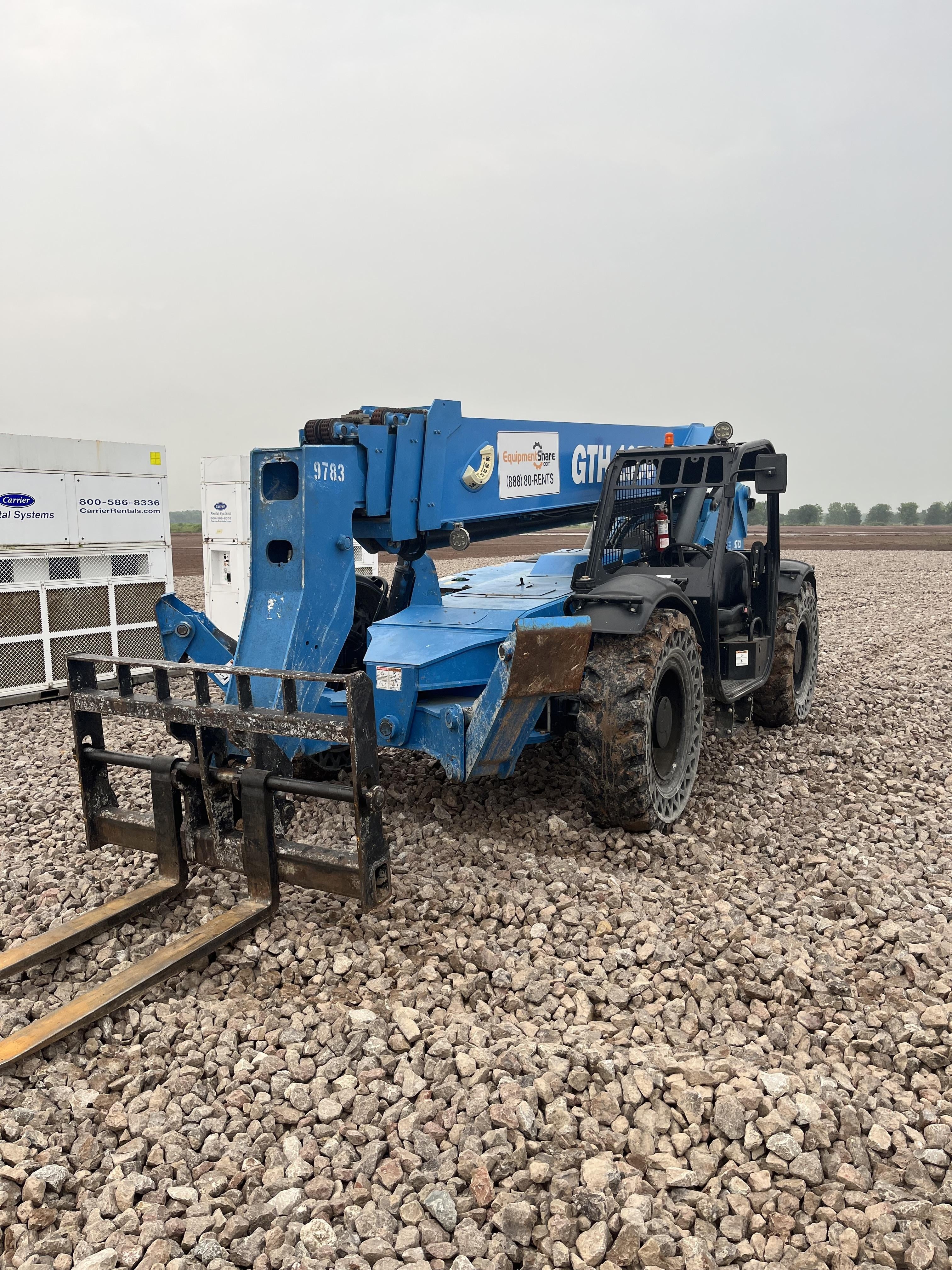 2018 Genie GTH-1056 Genie GTH-1056 w/Open ROPS, Solid Tires, Work Light/Beacon, 60" Carriage and Forks