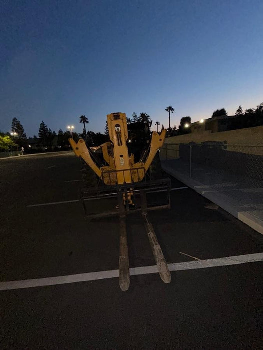 2019 JCB 510-56 74 HP w/Open ROPS, Beacon, Aux Hydraulics, Worklights, Solid Tires w/60" Carriage/Forks