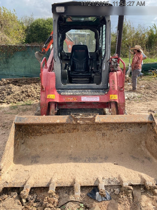 2019 Takeuchi TL8 Cab, Heat/AC, Defroster, 15" Wide Rubber Tracks, Back-up Alarm, Front & Rear Working Lights, Auxiliary Hydraulics, Two-Speed Travel, Electronic Monitoring System, Hydraulic Universal Quick Hitch 76" HD Dirt Bucket with 8 Teeth, 20.3 cubic feet Capacity