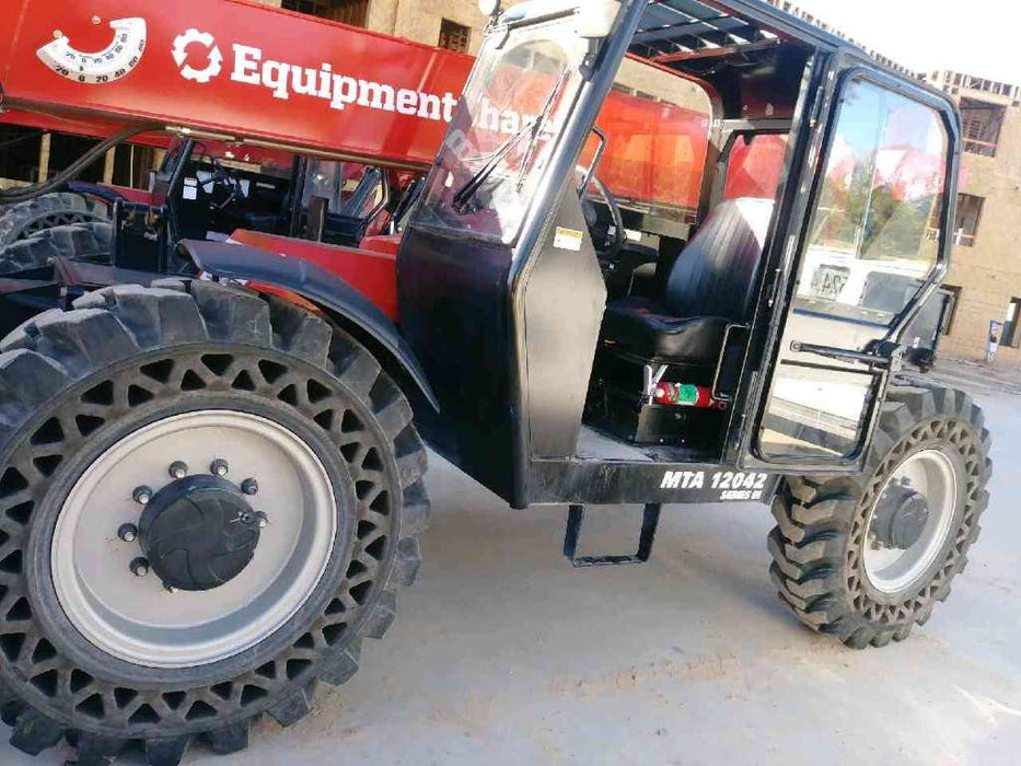 2019 Manitou MTA12042 Cab/Heat/Air, 120 HP, Solid Tires, Work Lights, Lift Hook, Auxiliary Hydraulics 66" Carriage and 60" Forks