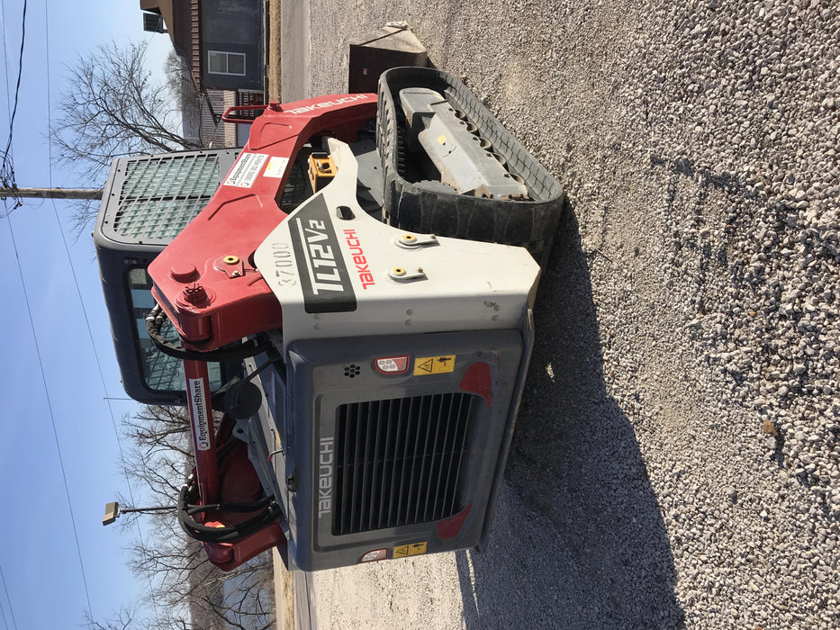2019 Takeuchi TL12V2C Cab/Heat/Air w/Auxiliary Hydraulics, 2 Speed, Hydraulic QC 80" Tooth Bucket, 48" Pallet Forks