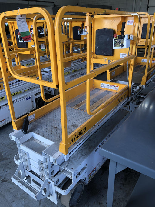 Custom Equipment HB-1430 <ul>
 <li>Hy-Brid Scissor Lift</li>
  <li>Platform capacity up to 670 lbs.</li>
  <li>Working height up to 20 ft</li>
  <li>Weighs under 1,700 lbs.</li>
  <li>Non-marking wheels </li>
</ul>