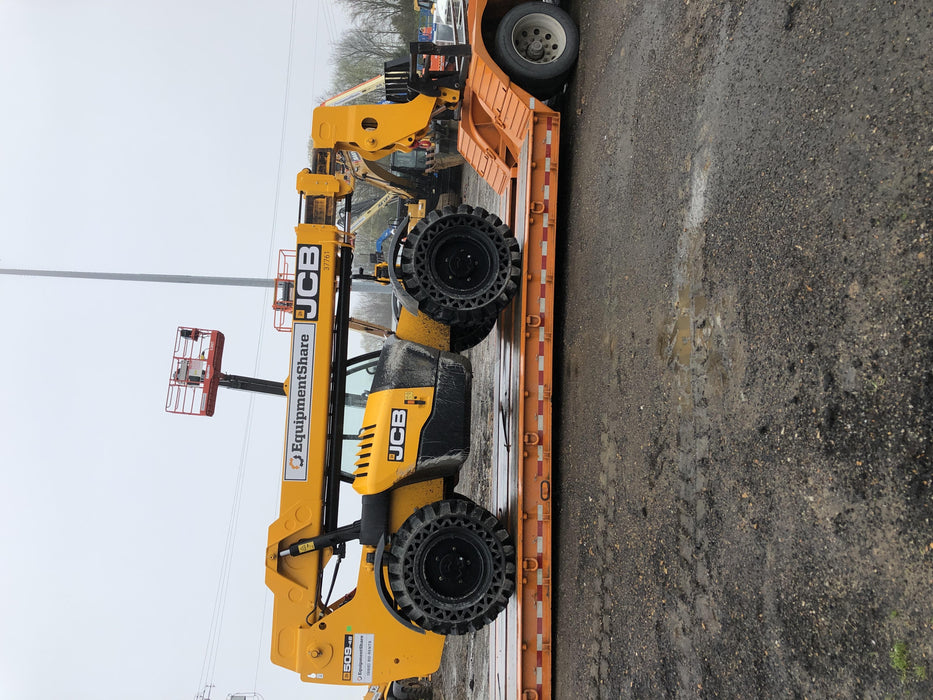 2019 JCB 509-42 Open ROPS, 74 HP, Solid Tires, Worklights, Beacon, Aux Hydraulics, Lifting Eye 66" Carriage/60" Forks