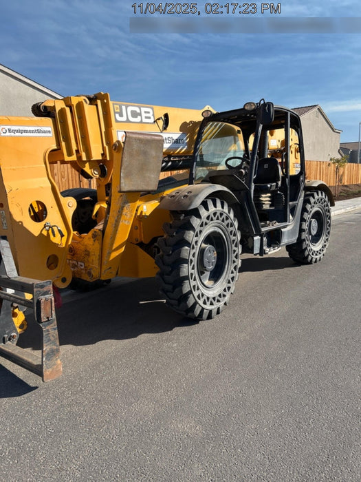 2019 JCB 510-56 74 HP w/Open ROPS, Beacon, Aux Hydraulics, Worklights, Solid Tires w/60" Carriage/Forks