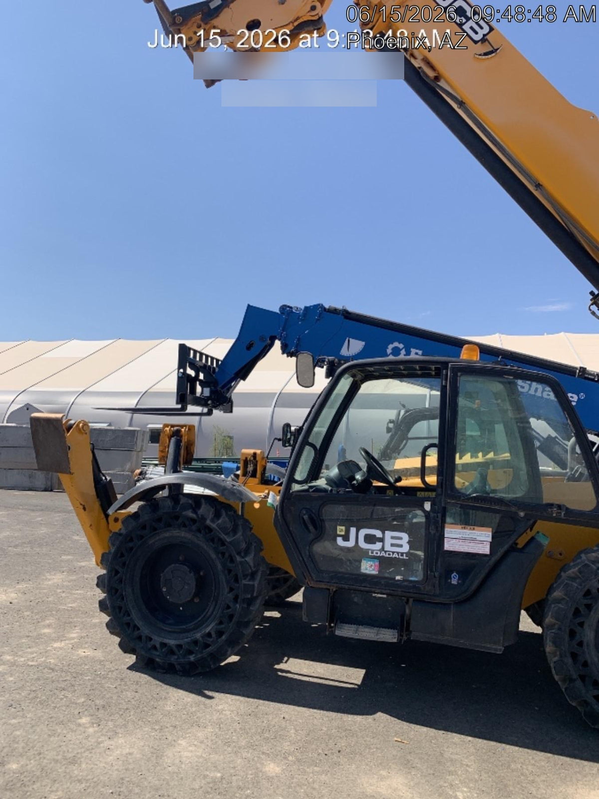 2019 JCB 512-56 74 HP w/CAB/HVAC, Beacon, Aux Hydraulics, Worklights, Solid Tires w/60" Carriage/Forks