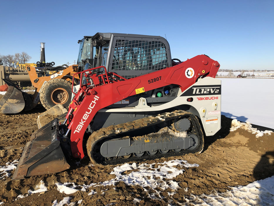 2019 Takeuchi TL12V2C ROPS/FOPS Cab, Heat/AC, Defroster, Rubber Tracks, Back-up Alarm, Front & Rear Working Lights, Auxiliary Hydraulics, Two-Speed Travel, Electronic Monitoring System, Hydraulic Universal Quick Hitch w/80" HD Dirt Bucket with 9 Teeth 24.0 cu.ft. Capacity
