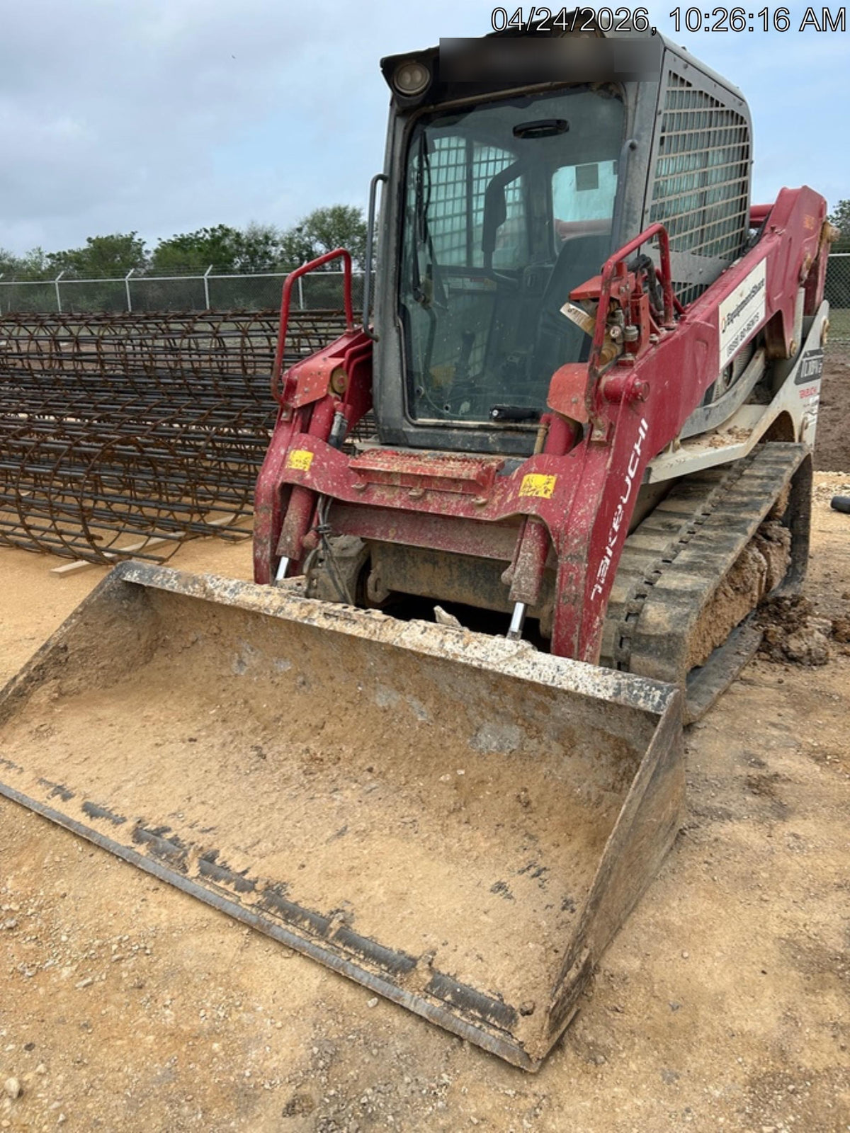 2019 Takeuchi TL10V2-CR Cab/Heat/AC, Rubber Tracks, Backup Alarm, Front & rear working Lights, Auxiliary Hydraulics, 2 Speed Travel, Engine Monitoring System, Hydraulic universal quick hitch w/76" HD smooth dirt bucket with bolt-on edge, 20.3 cubic feet capacity, 48" Pallet forks and frame