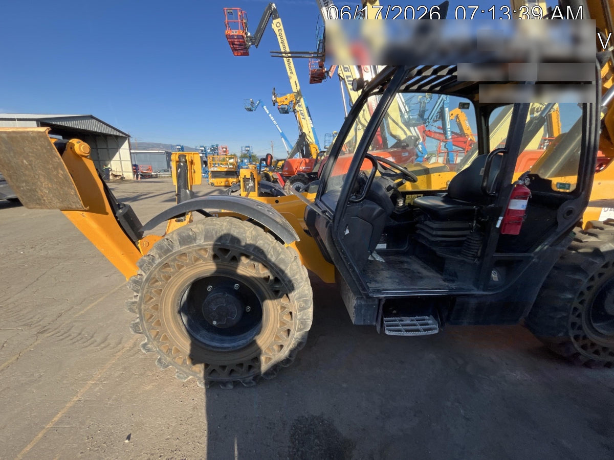 2019 JCB 510-56 74 HP w/Open ROPS, Beacon, Aux Hydraulics, Worklights, Solid Tires w/60" Carriage/Forks