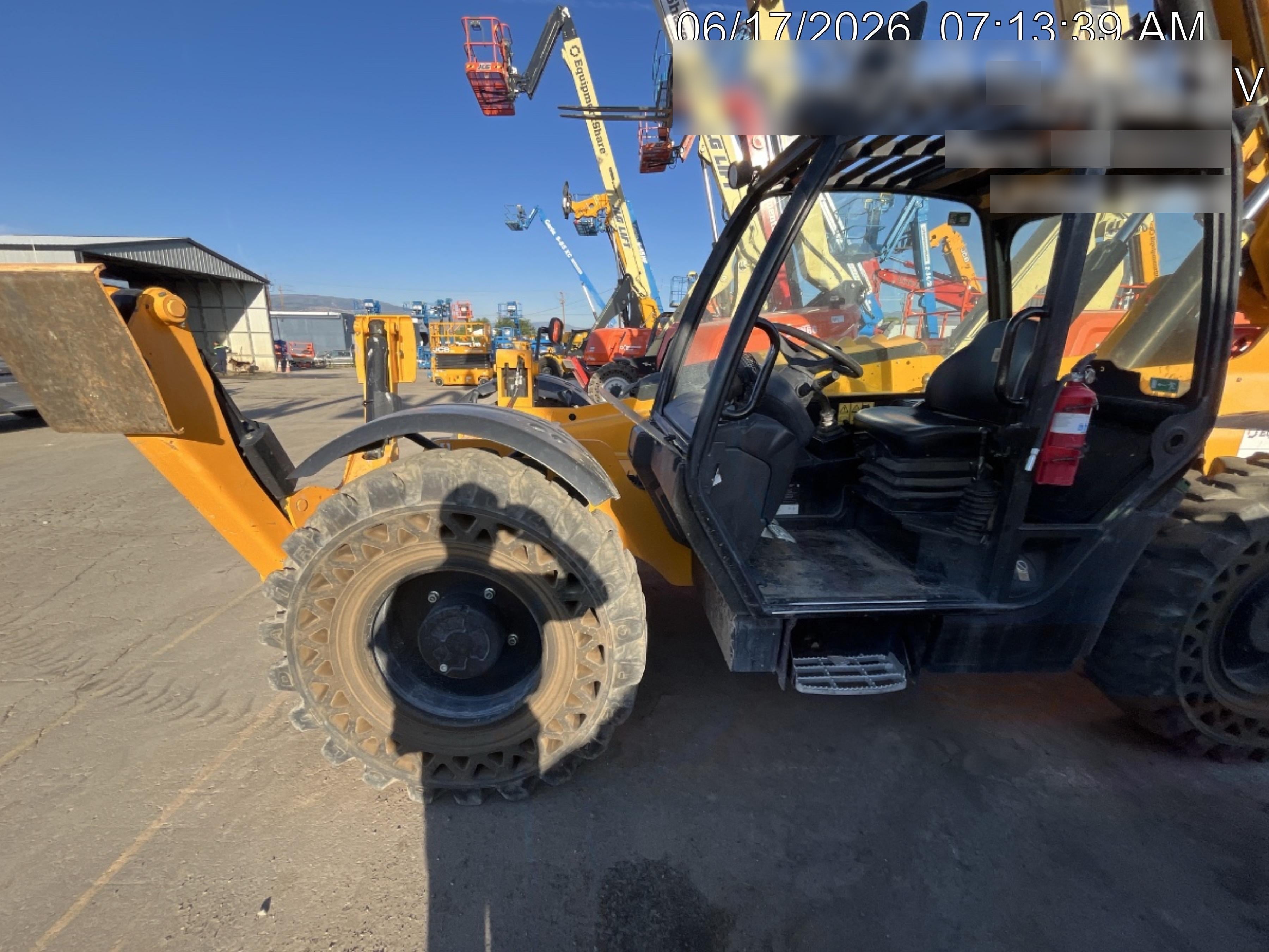 2019 JCB 510-56 74 HP w/Open ROPS, Beacon, Aux Hydraulics, Worklights, Solid Tires w/60" Carriage/Forks