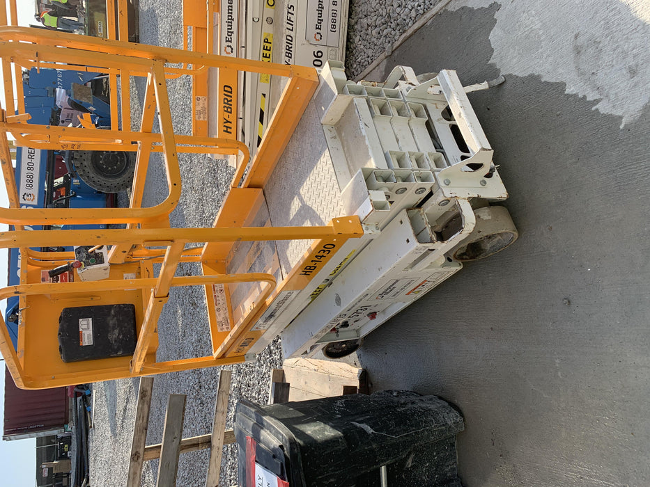 Custom Equipment HB-1430 <ul>
 <li>Hy-Brid Scissor Lift</li>
  <li>Platform capacity up to 670 lbs.</li>
  <li>Working height up to 20 ft</li>
  <li>Weighs under 1,700 lbs.</li>
  <li>Non-marking wheels </li>
</ul>