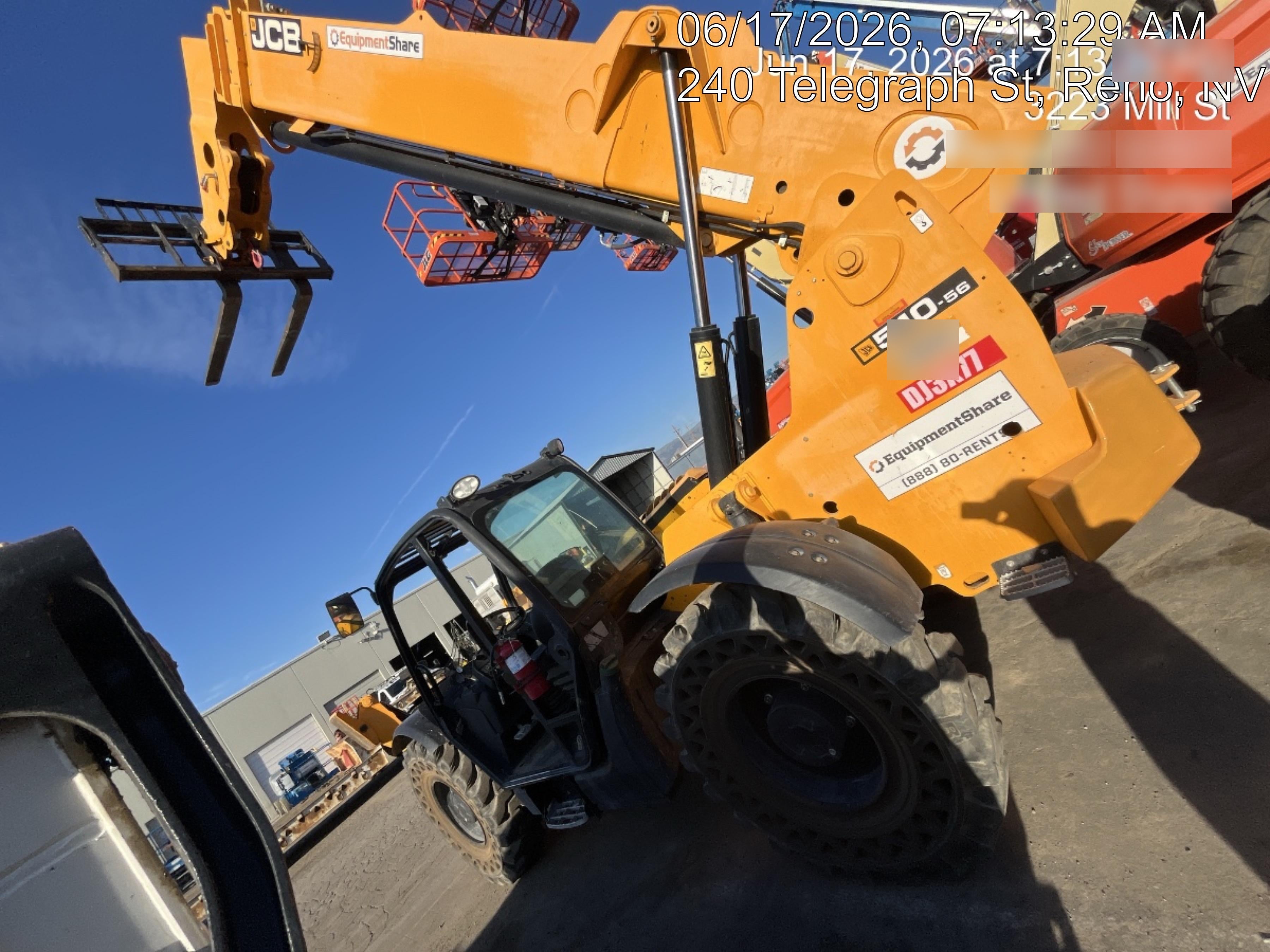 2019 JCB 510-56 74 HP w/Open ROPS, Beacon, Aux Hydraulics, Worklights, Solid Tires w/60" Carriage/Forks