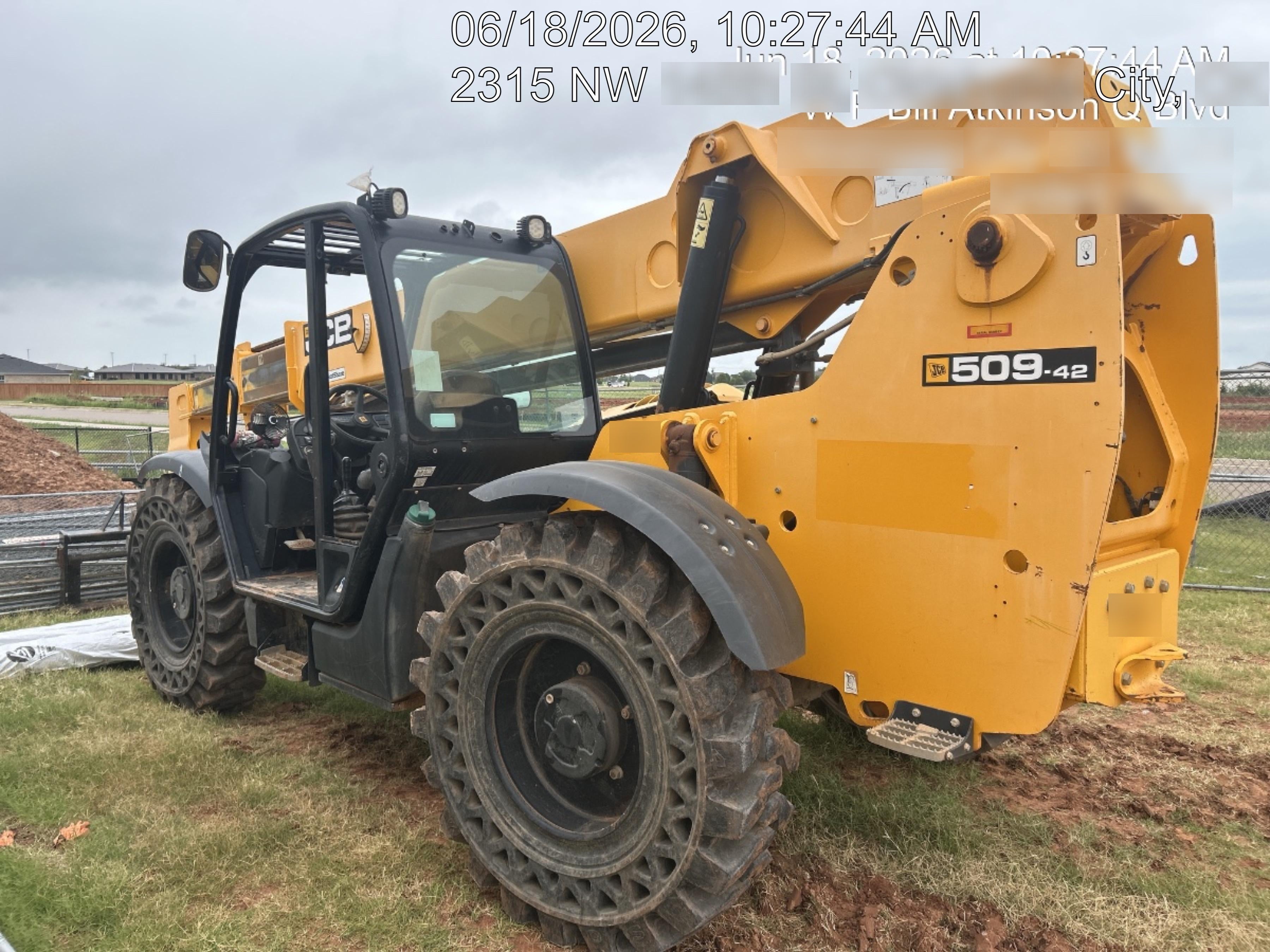 2019 JCB 509-42 74 HP w/Open ROPS, Beacon, Aux Hydraulics, LED Work lights, Solid Tires 66" Carriage/60" Forks