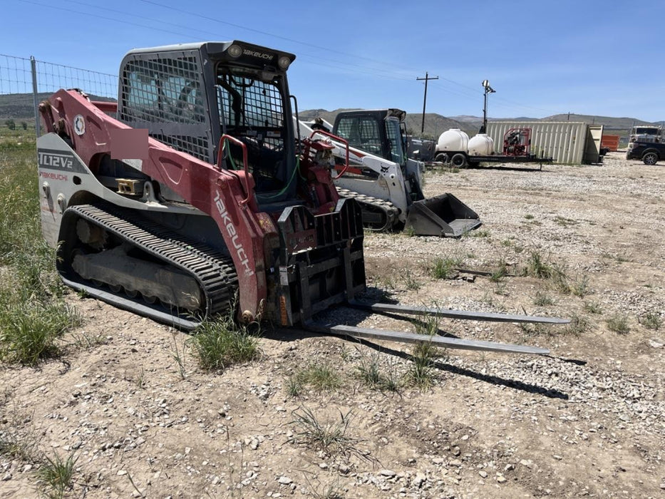 2019 Takeuchi TL12V2C ROPS/FOPS Cab, Heat/AC, Defroster, Rubber Tracks, Back-up Alarm, Front & Rear Working Lights, Auxiliary Hydraulics, Two-Speed Travel, Electronic Monitoring System, Hydraulic Universal Quick Hitch w/80" HD Dirt Bucket with 9 Teeth 24.0 cu.ft. Capacity