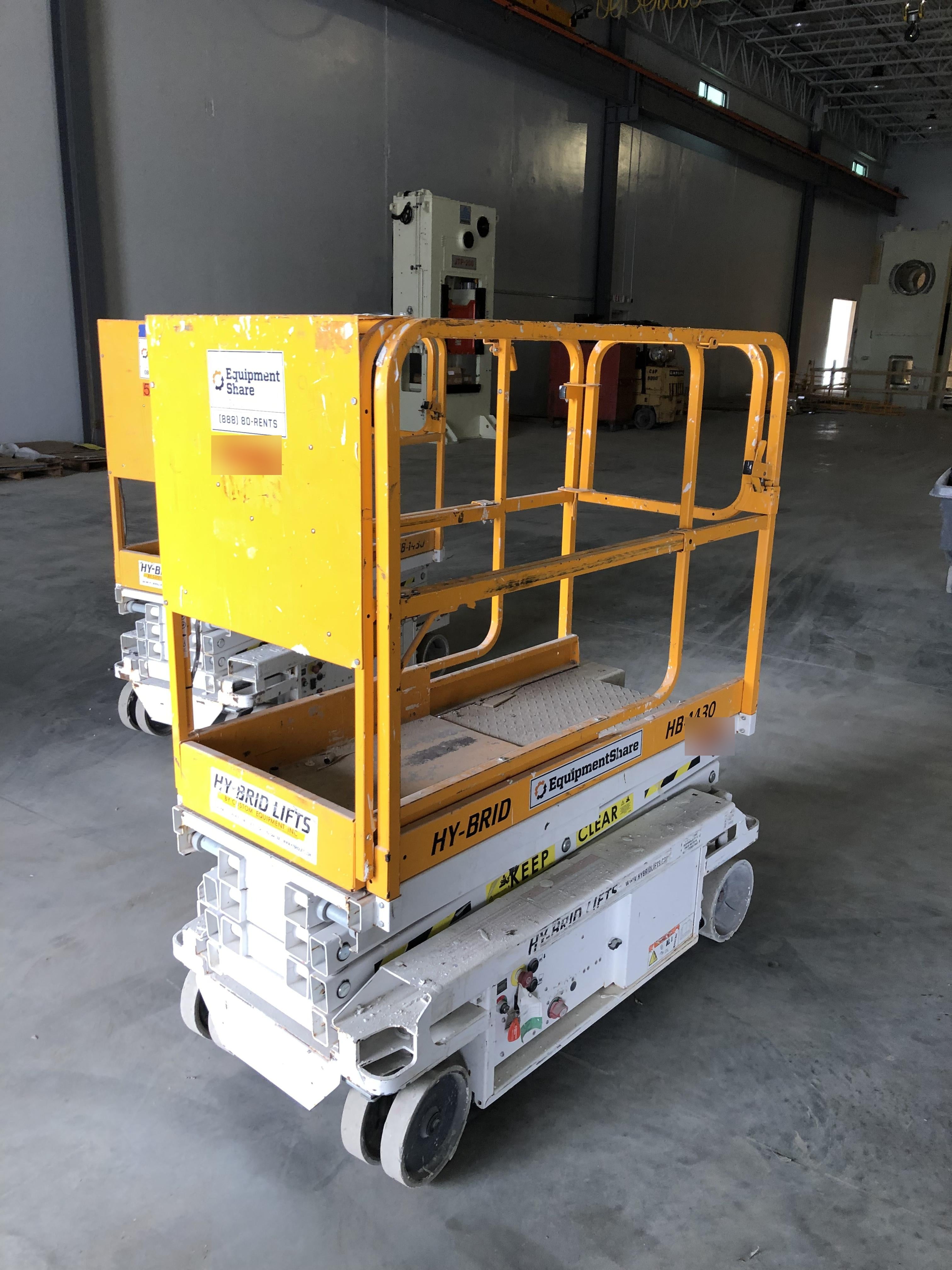 Custom Equipment HB-1430 <ul>
 <li>Hy-Brid Scissor Lift</li>
  <li>Platform capacity up to 670 lbs.</li>
  <li>Working height up to 20 ft</li>
  <li>Weighs under 1,700 lbs.</li>
  <li>Non-marking wheels </li>
</ul>