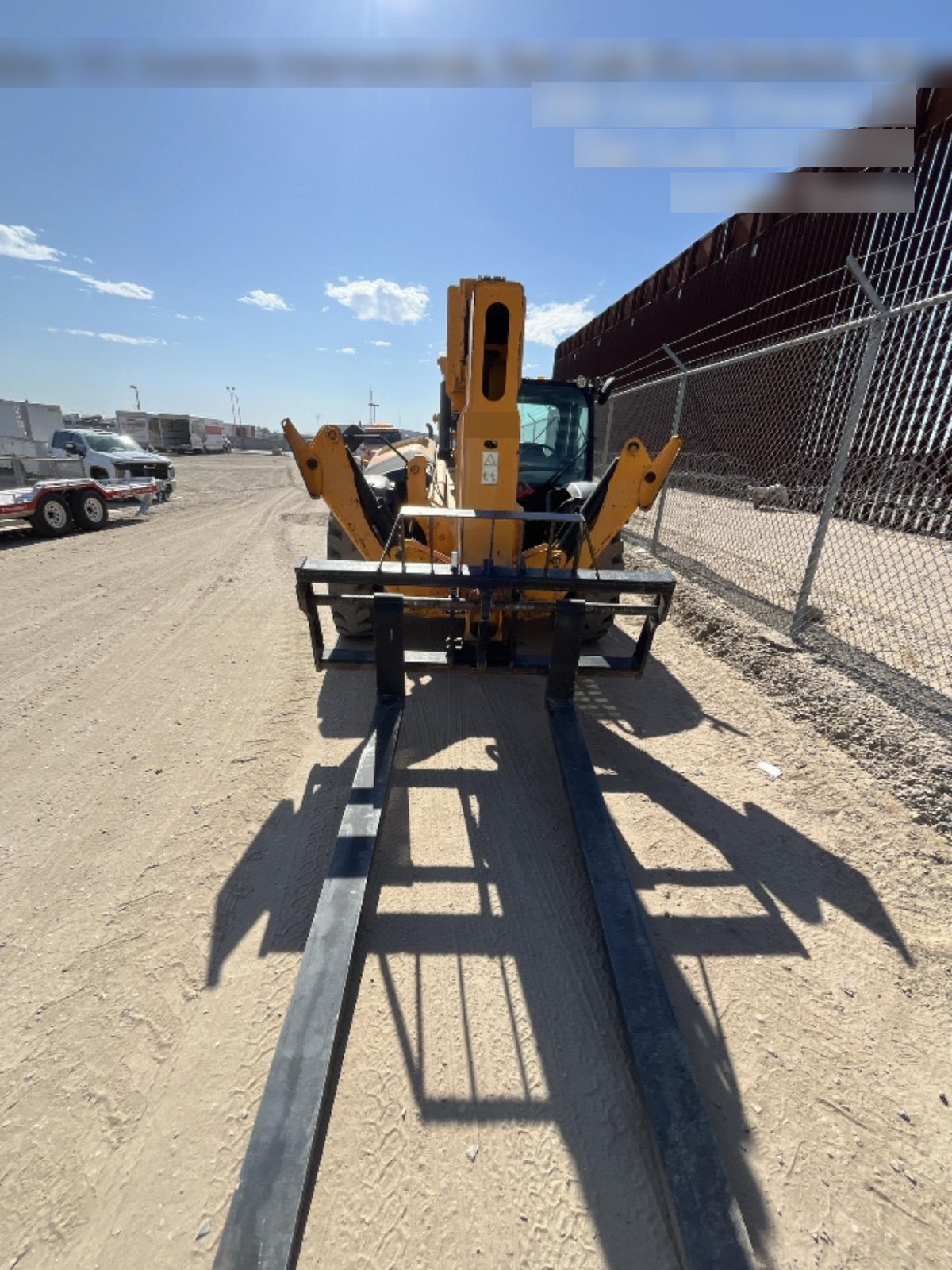 2019 JCB 512-56 74 HP w/CAB/HVAC, Beacon, Aux Hydraulics, Worklights, Solid Tires w/60" Carriage/Forks
