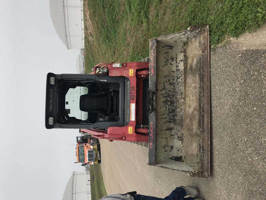 2019 Takeuchi TL8 Cab, Heat/AC, Defroster, 15" Wide Rubber Tracks, Back-up Alarm, Front & Rear Working Lights, Auxiliary Hydraulics, Two-Speed Travel, Electronic Monitoring System, Hydraulic Universal Quick Hitch 76" HD Smooth Dirt Bucket with Bolt-On Edge, 20.3 cubic feet Capacity