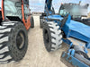 2019 Genie GTH-1056 Cab/Heat/AC, Solid RT Tires, LED Work Lights, Beacon 60" QA Carriage, 60" Forks