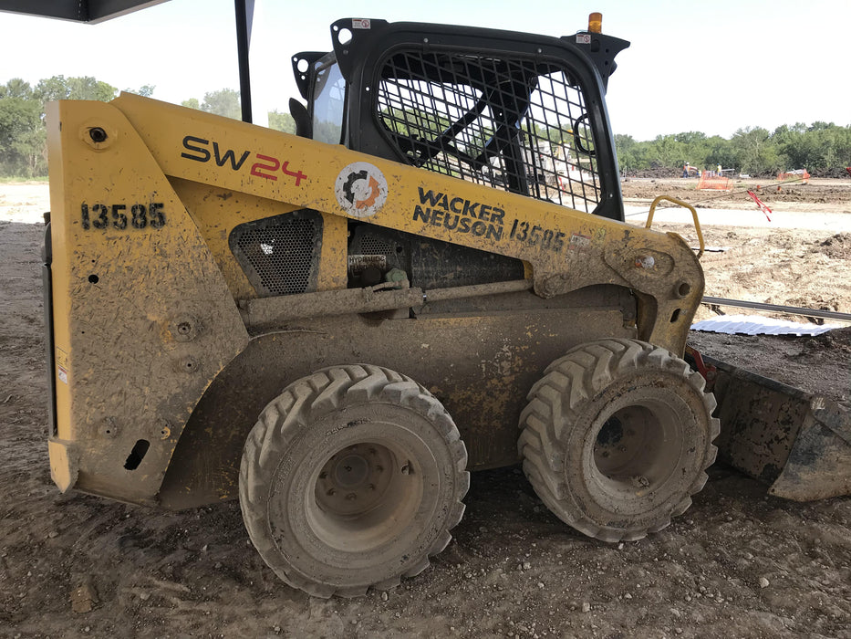 Wacker Neuson SW24 Wacker Neuson SW24 8k Wheeled Skid Loader, ROPS, 75" Bucket LP w/ Teeth , 72â€ Angle broom with universal controller 8 pin