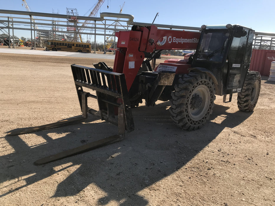 2019 Manitou MTA12042 Cab/Heat/Air, 120 HP, Solid Tires, Work Lights, Lift Hook, Auxiliary Hydraulics 66" Carriage and 60" Forks