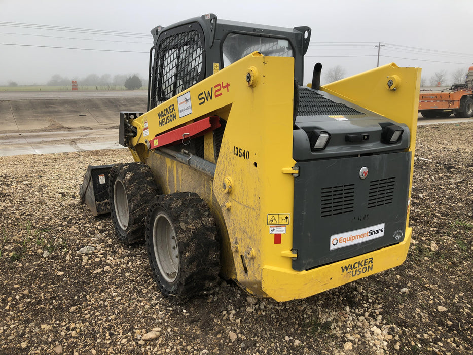 Wacker Neuson SW24 SW24 8K Wheeled Skid Loader, Cab/Heat/AC , ISO , Bucket Leveling, Solid Tires, 75" Bucket LP w/ Teeth