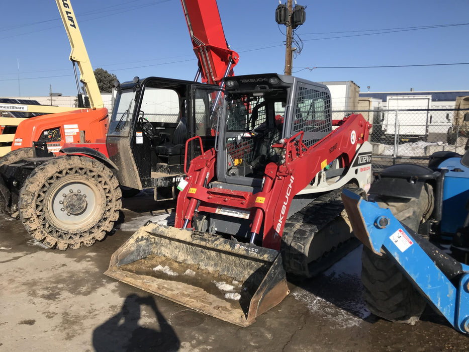 2019 Takeuchi TL12V2C ROPS/FOPS Cab, Heat/AC, Defroster, Rubber Tracks, Back-up Alarm, Front & Rear Working Lights, Auxiliary Hydraulics, Two-Speed Travel, Electronic Monitoring System, Hydraulic Universal Quick Hitch w/80" HD Dirt Bucket with 9 Teeth 24.0 cu.ft. Capacity