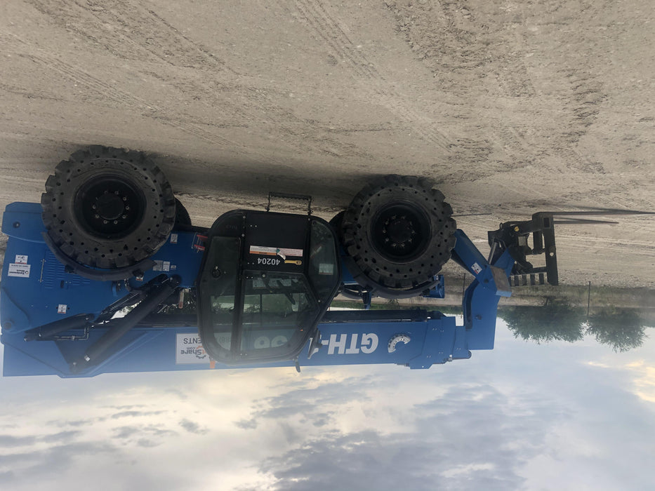 2019 Genie GTH-1056 Cab/Heat/AC, Solid RT Tires, LED Work Lights, Beacon 60" QA Carriage, 60" Forks